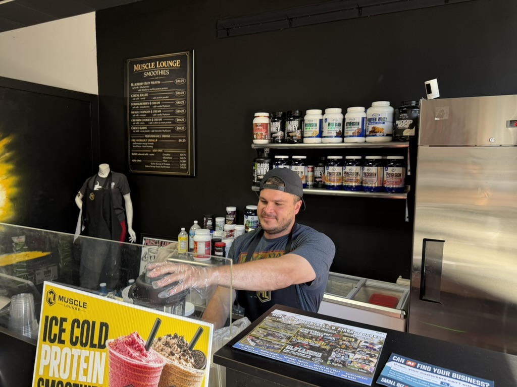 Blending smoothies behind the counter